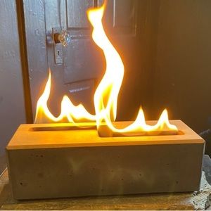 FLIKR FIRE XL personal concrete fireplace. Made for indoor or outdoor use!